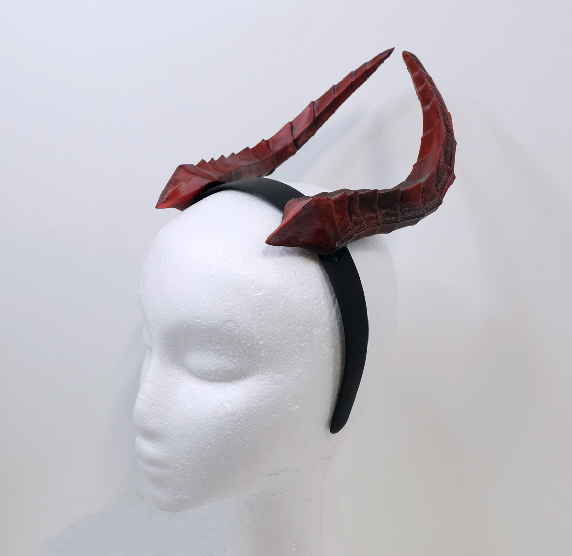 Curved Red Horns